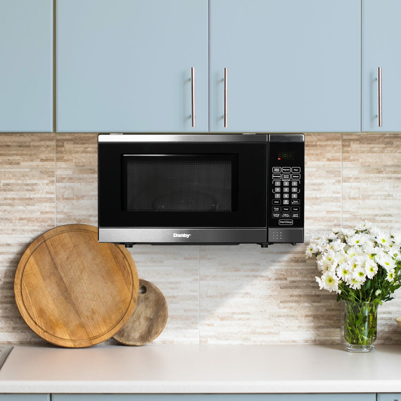 Danby Designer 0.7 cu. ft. Space Saving Under the Cupboard Microwave